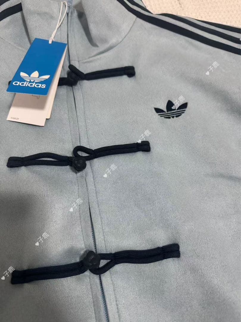 adidasアディダス 中国限定 蛇年トラックジャケットダー みずいろ XL