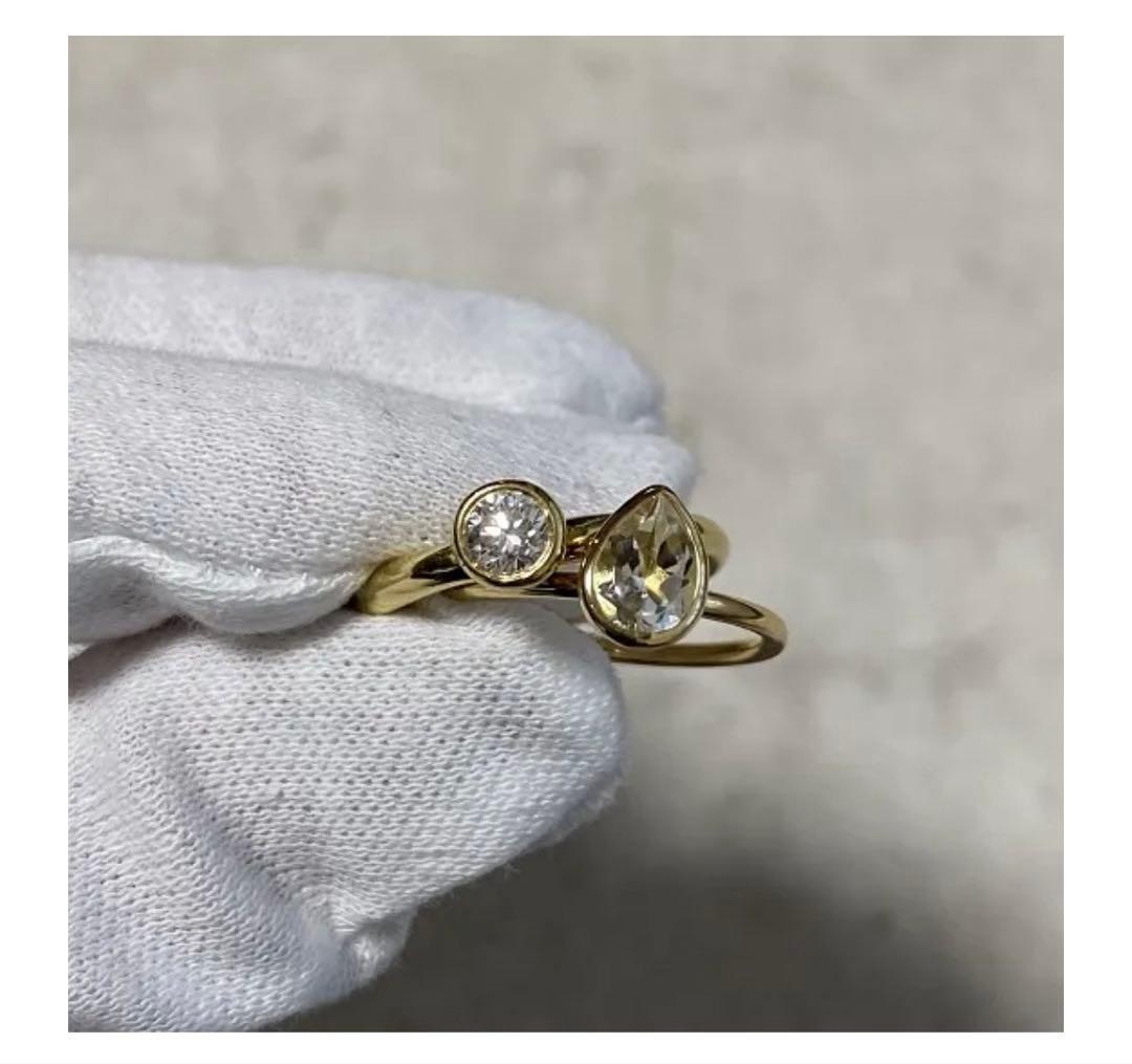 【セール】JProducts 18k teardropringSホワイトトパーズ