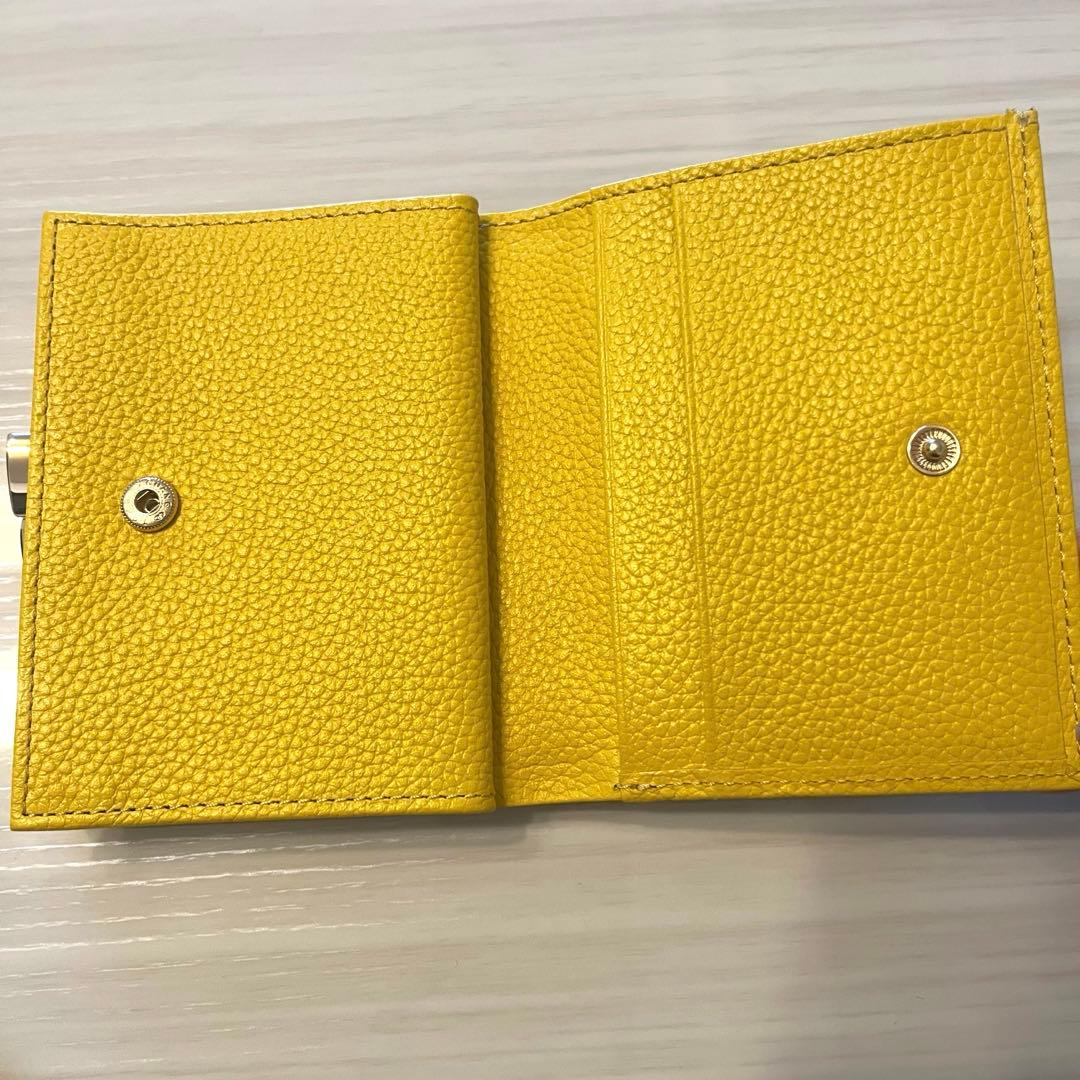 【新品・未使用】皇居 二つ折り財布 黄色 イエロー　がま口
