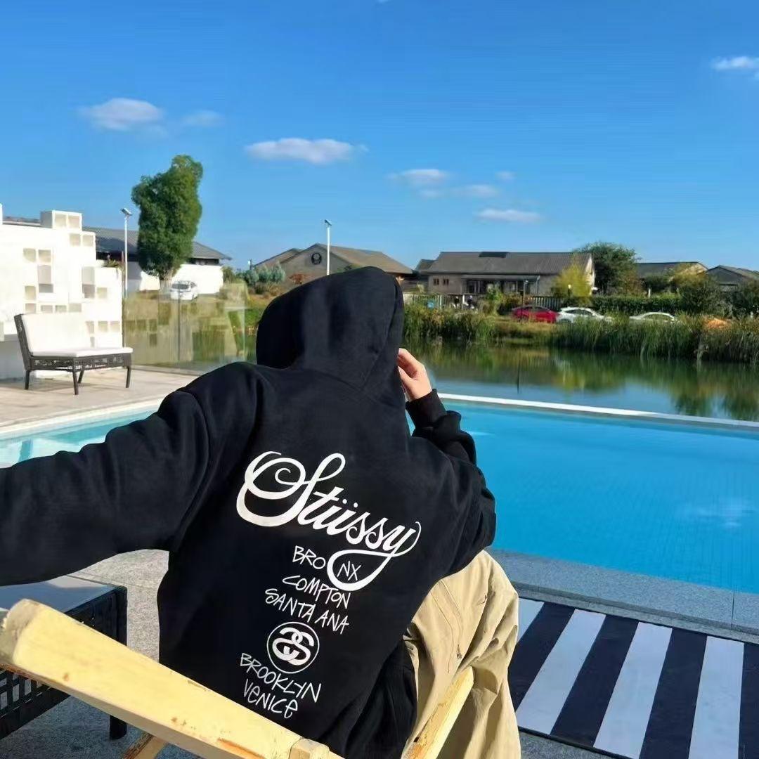 新品STÜSSY ワールドツアー プリント パーカー ブラック ステューシp