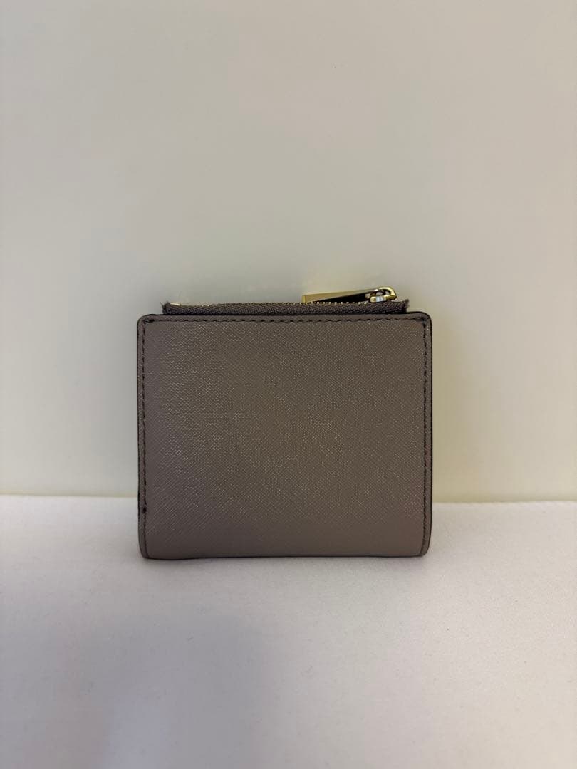 トリーバーチ　tory burch ベージュ　二つ折り財布