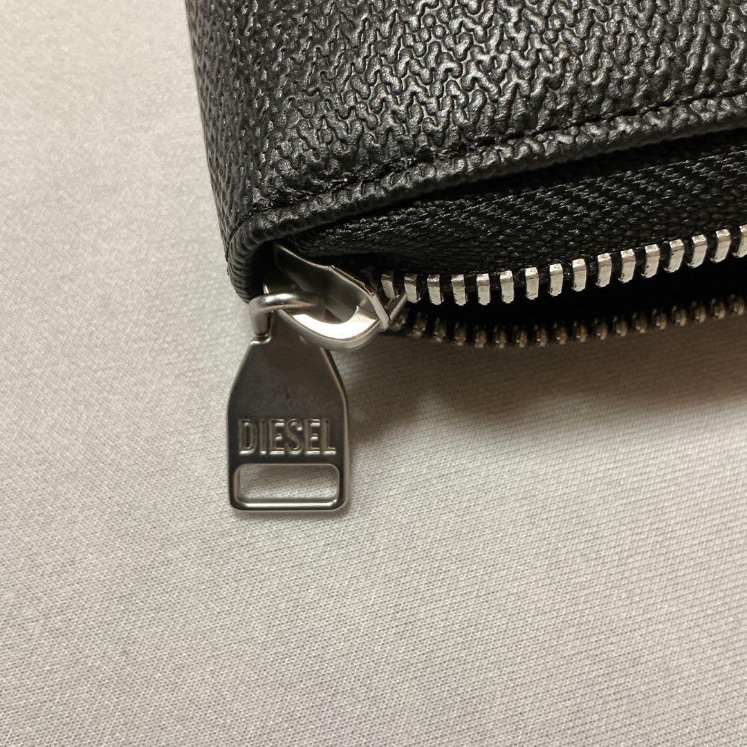 洗練されたデザイン　DIESEL BI-FOLD COIN ZIP X09666