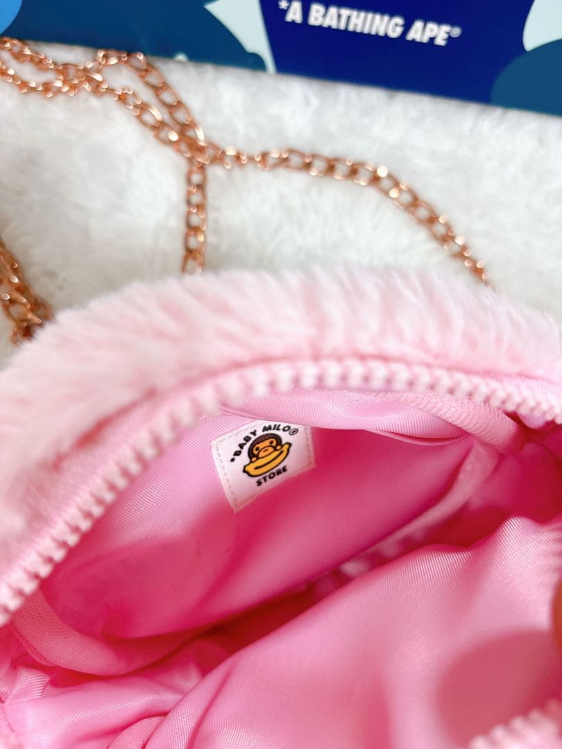 ピンクの猿の顔ハンドバッグ