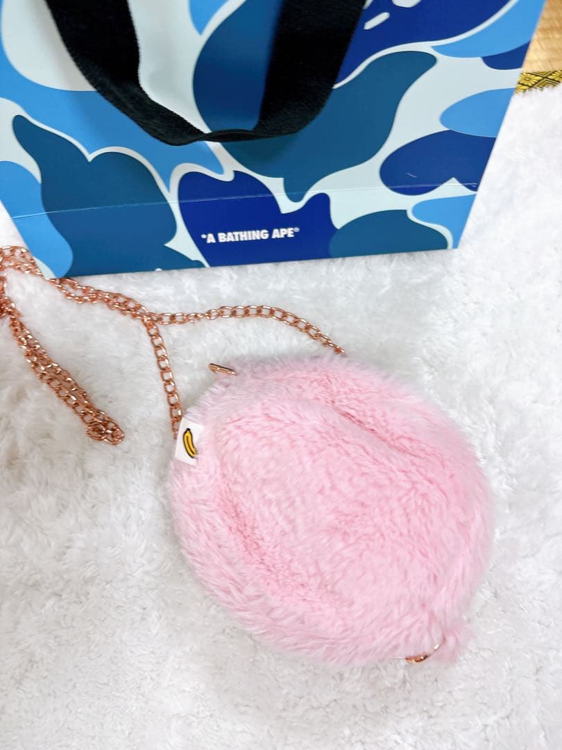 ピンクの猿の顔ハンドバッグ