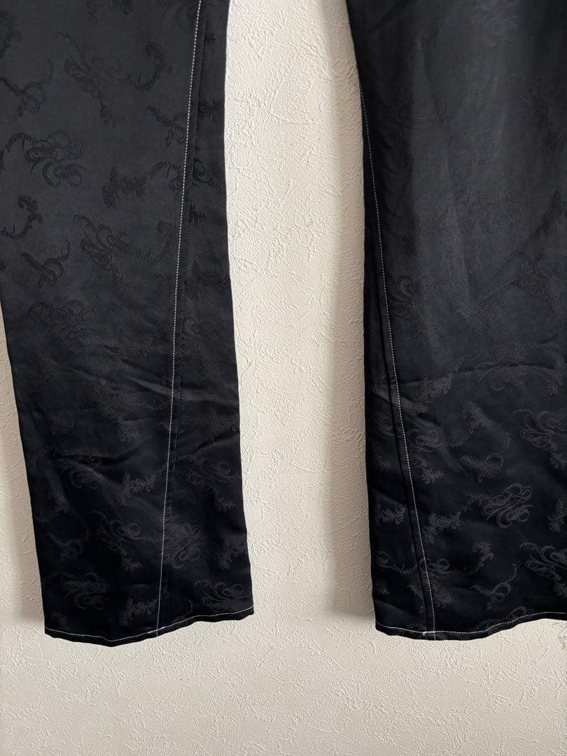 sulvam スティッチスリムフレアパンツ