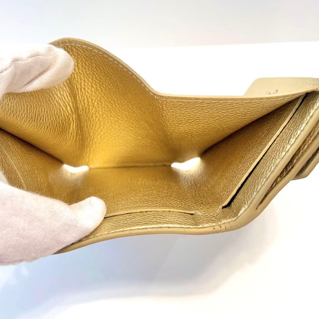 ルイヴィトン ポルトフォイユ ロックミニ 折り財布 ゴールド M69059