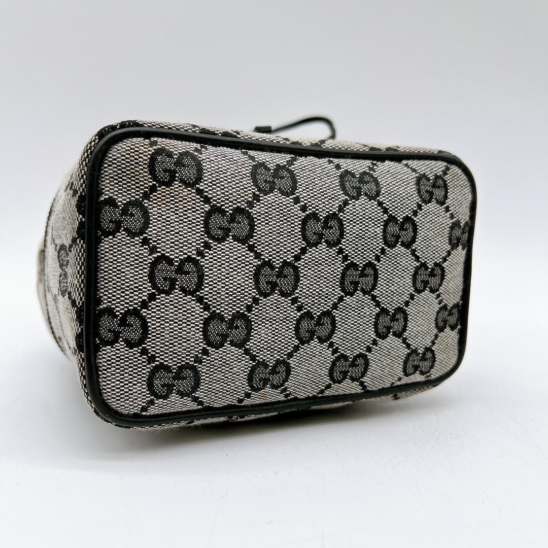 良品 GUCCI GGキャンバス プレート バニティポーチ 巾着 e650