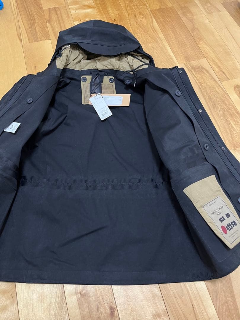 新品未使用187.000円　TenC CARGO PARKA