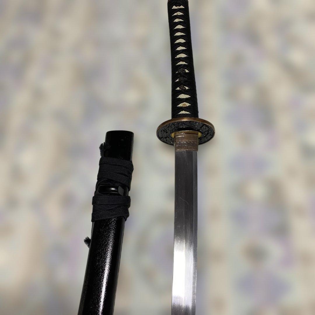 上級模造刀 黒柄 雲龍金縁楕円鍔