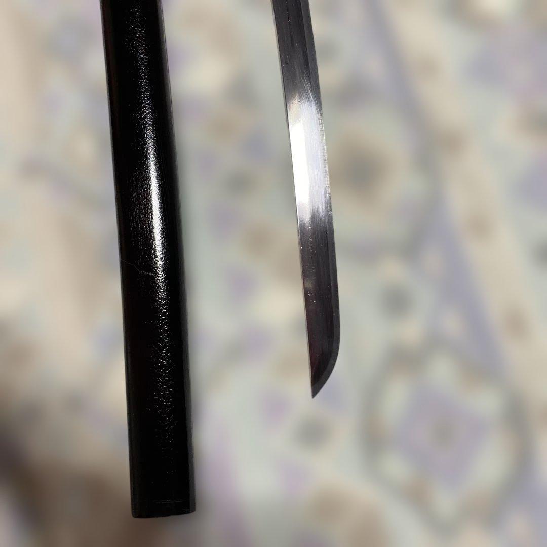 上級模造刀 黒柄 雲龍金縁楕円鍔