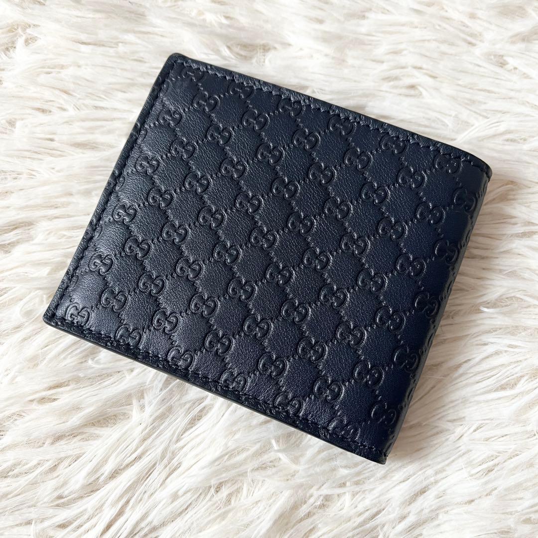 ⭐️新品未使用⭐️　GUCCI　マイクログッチシマ　二つ折り財布　ネイビー　レザー