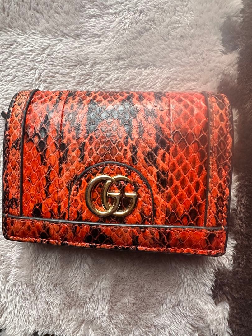 GUCCI ヘビ革 二つ折り財布 オレンジ　パイソン