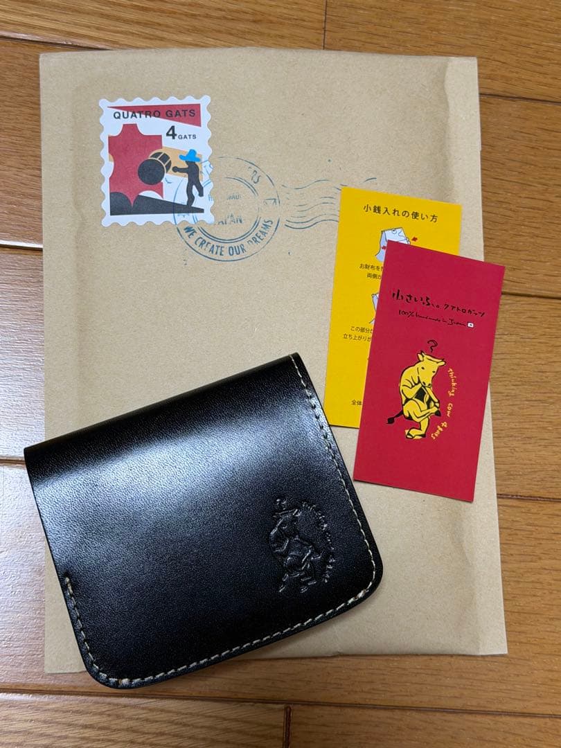 クアトロガッツ 小さいふ コンチャ 黒 2つ折り 革