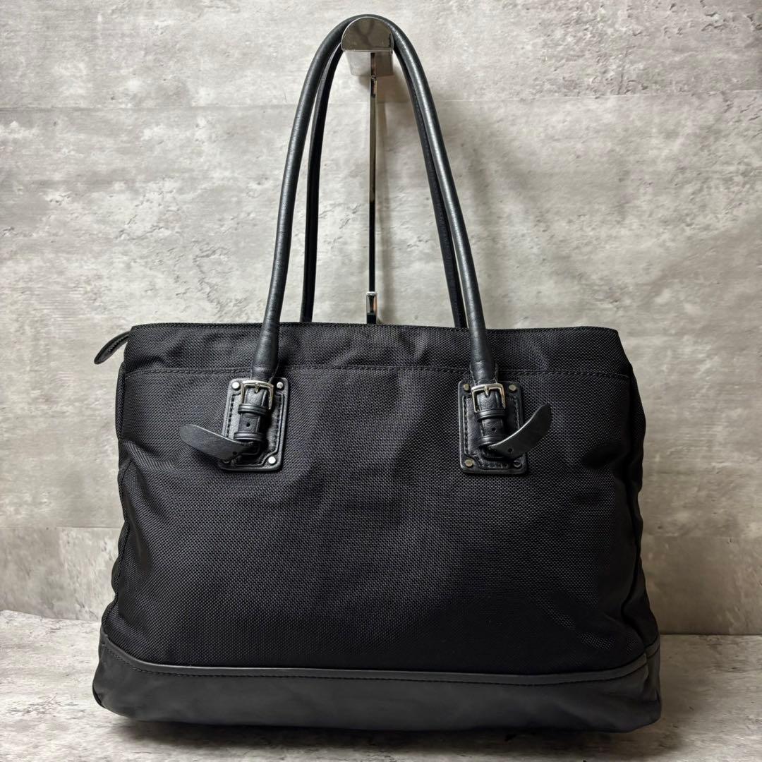 TUMI トートバッグ ビジネス レザー 本革 肩掛け可能 ブラック 保存袋