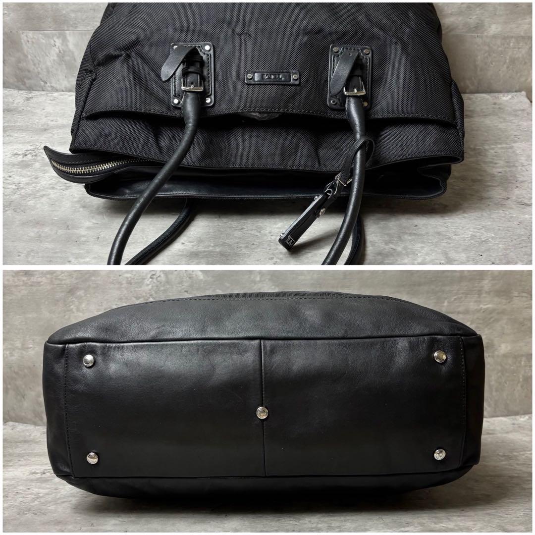 TUMI トートバッグ ビジネス レザー 本革 肩掛け可能 ブラック 保存袋