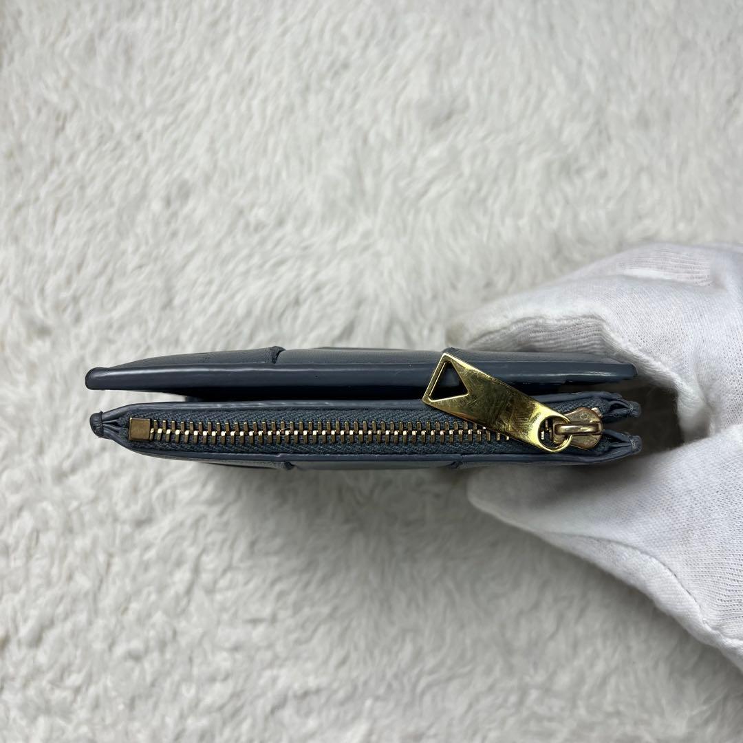 しょBOTTEGA VENETA 折り財布　カセット　グレー