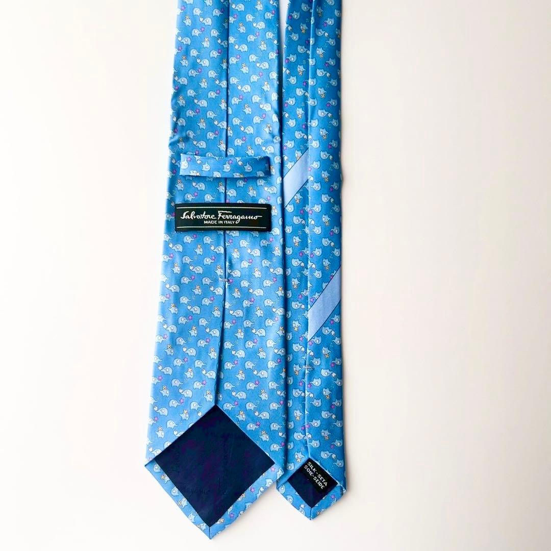 【未使用】フェラガモ シルクネクタイ 小象モチーフゾウ柄総柄 ライトブルー