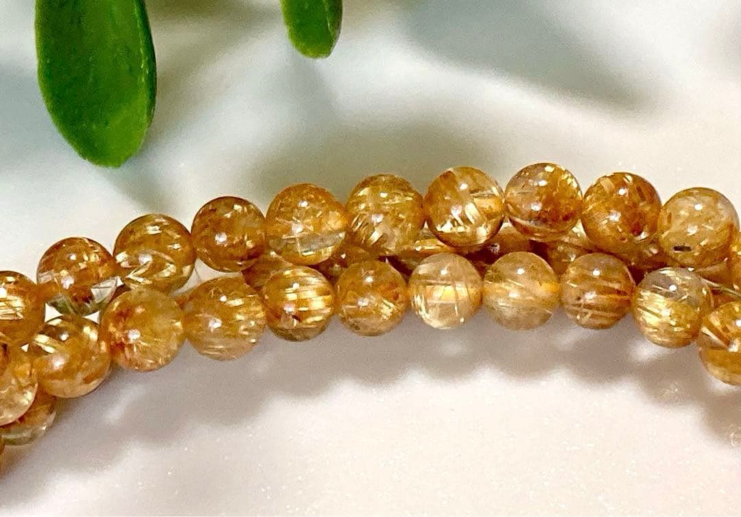究極品質　超希少幻の逸品　天然石の王者　タイチンルチルキャッツアイの多重編み