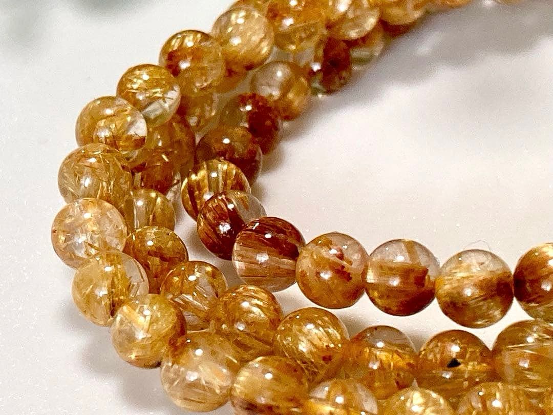 究極品質　超希少幻の逸品　天然石の王者　タイチンルチルキャッツアイの多重編み