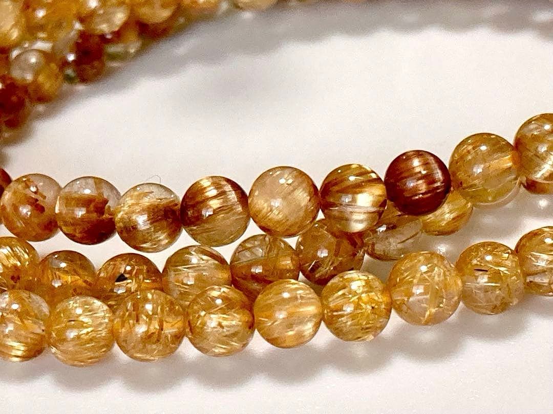 究極品質　超希少幻の逸品　天然石の王者　タイチンルチルキャッツアイの多重編み