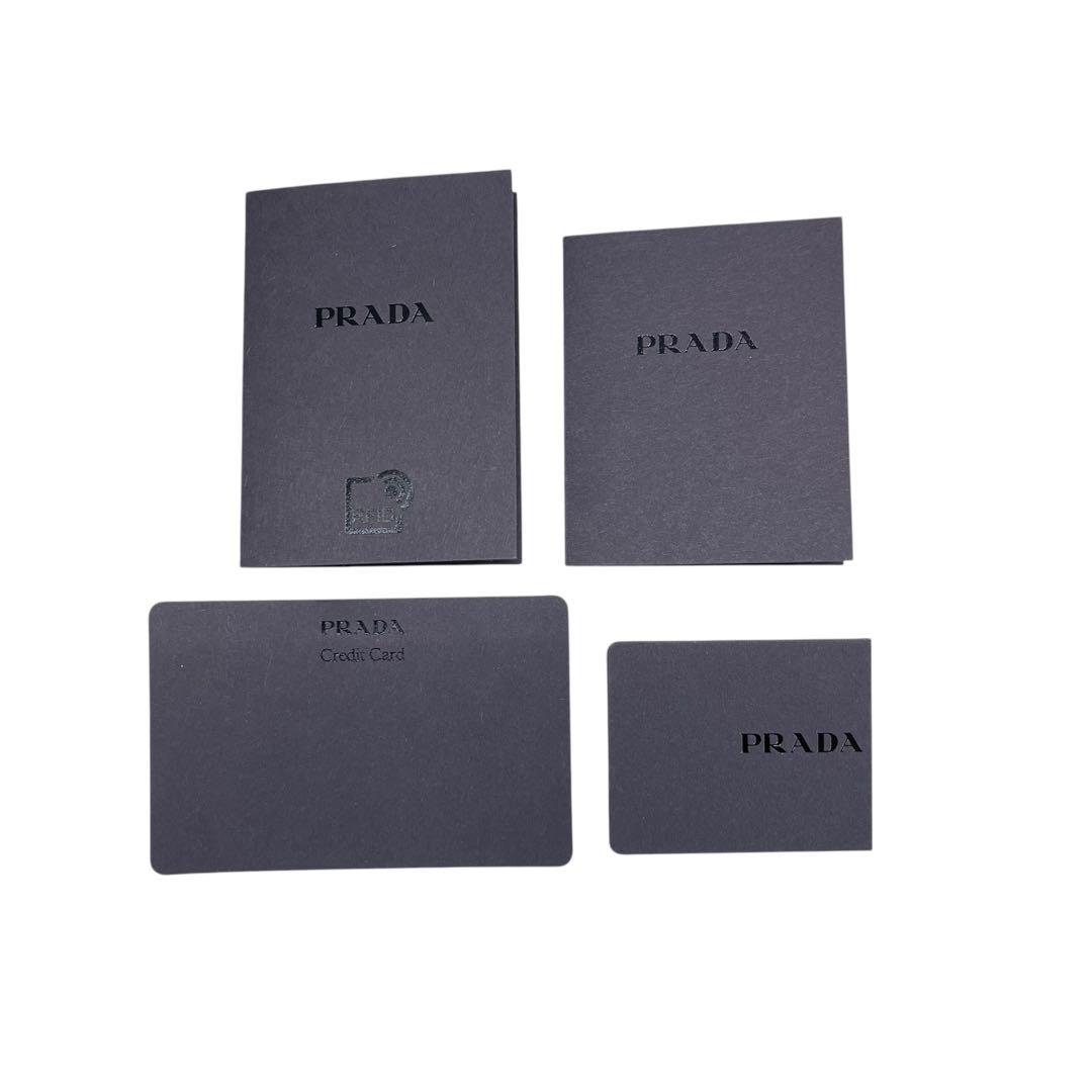 希少✨プラダ マネークリップ 札入れ シボ革 三角ロゴ レザー ブラック メンズ