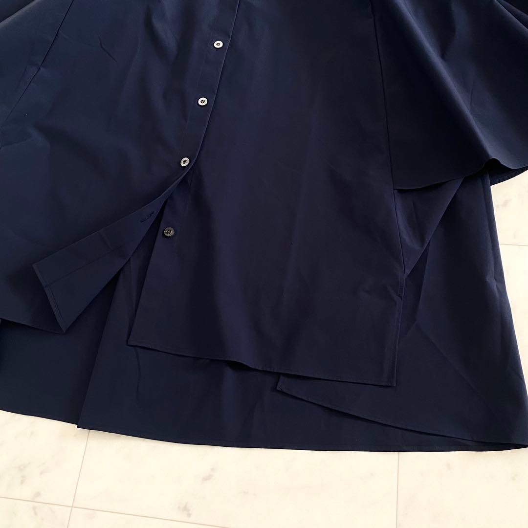 美品 アドーア ADOREスパンライクタイプライターブラウス ポンチョ 紺色