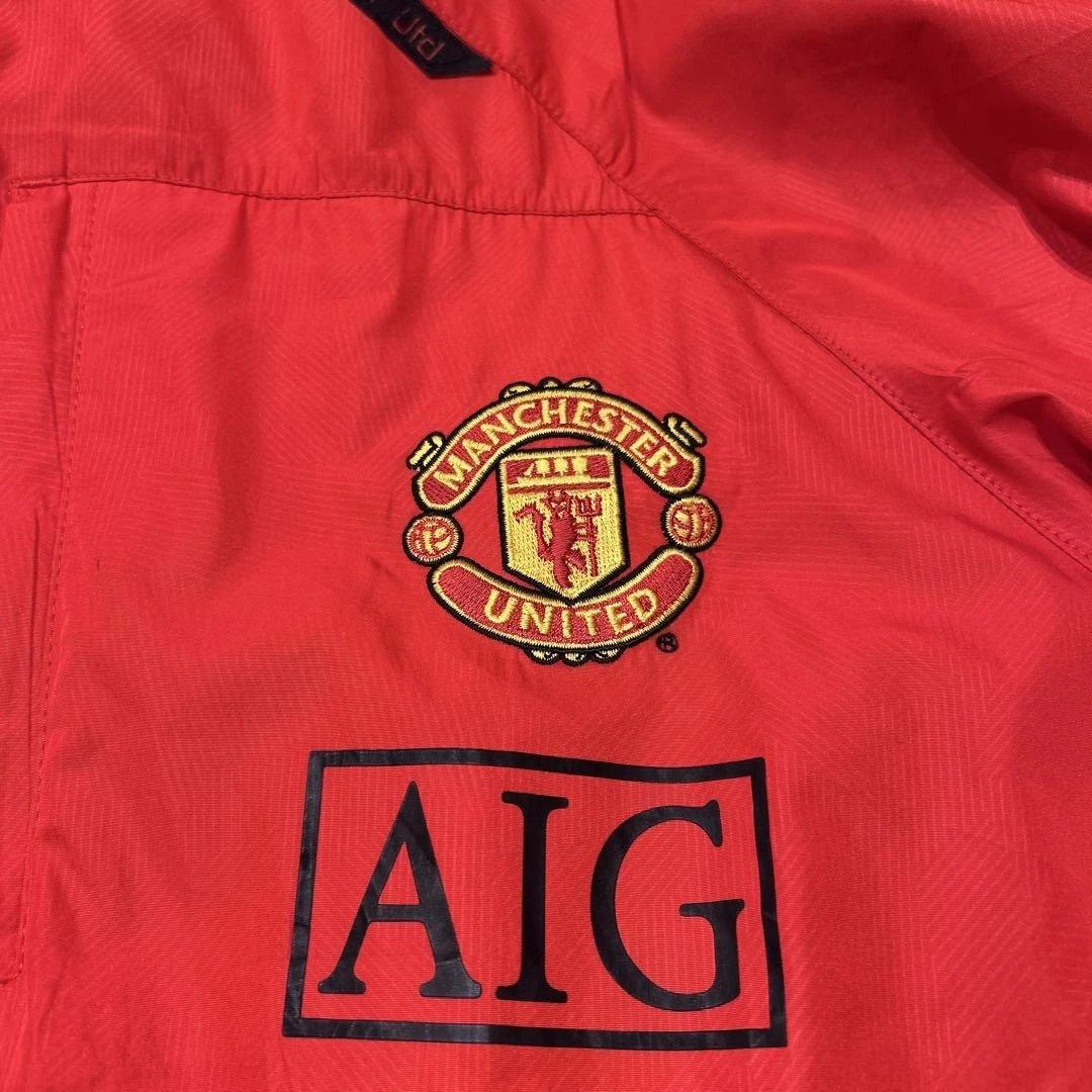 Nike マンチェスター・ユナイテッド ウィンドブレーカー オレンジ