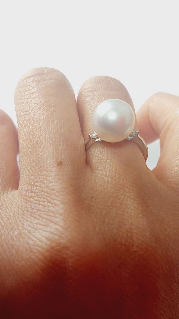 朝まで赤字の出品未販売鑑別書PT900白蝶11.1mmダイヤ0.15リング