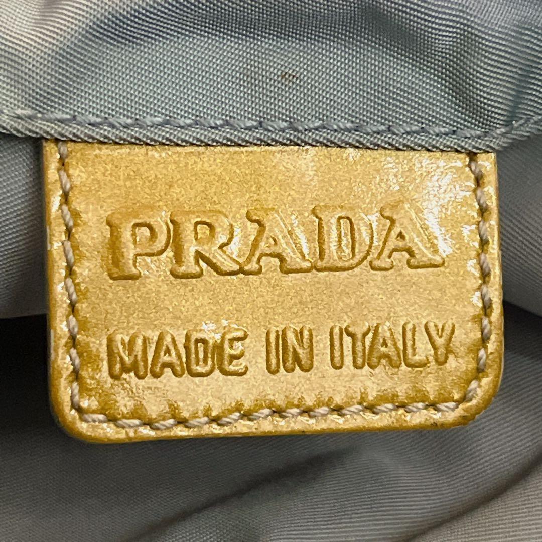 プラダ　ミニポーチ　巾着　化粧ポーチ　小物入れ　水色　ナイロン　三角ロゴ　y2k