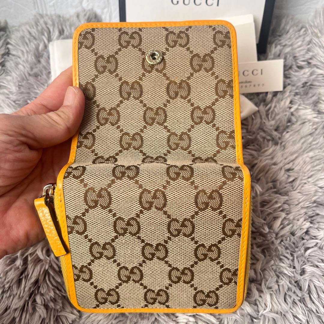 GUCCI 折り財布　GGキャンバス イエロー　ラウンドファスナー