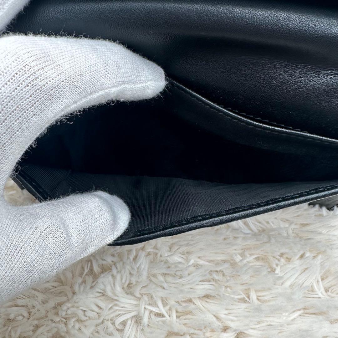 ✨美品✨グッチ　長財布　二つ折り財布　GG柄 ロゴプレート　レザー　黒