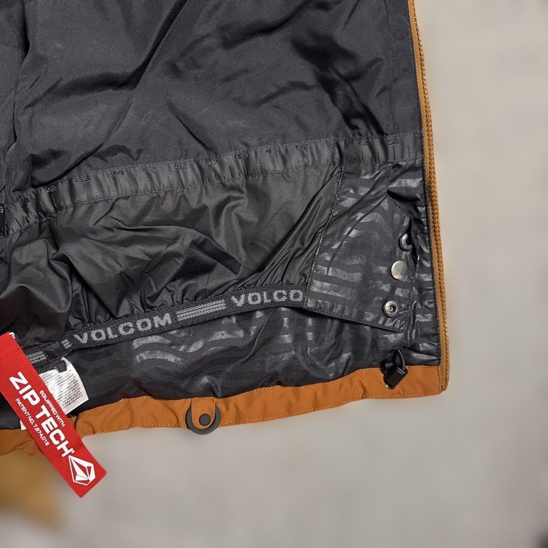 Volcom オレンジ(ブラウンっぽさも)フード付きジャケット