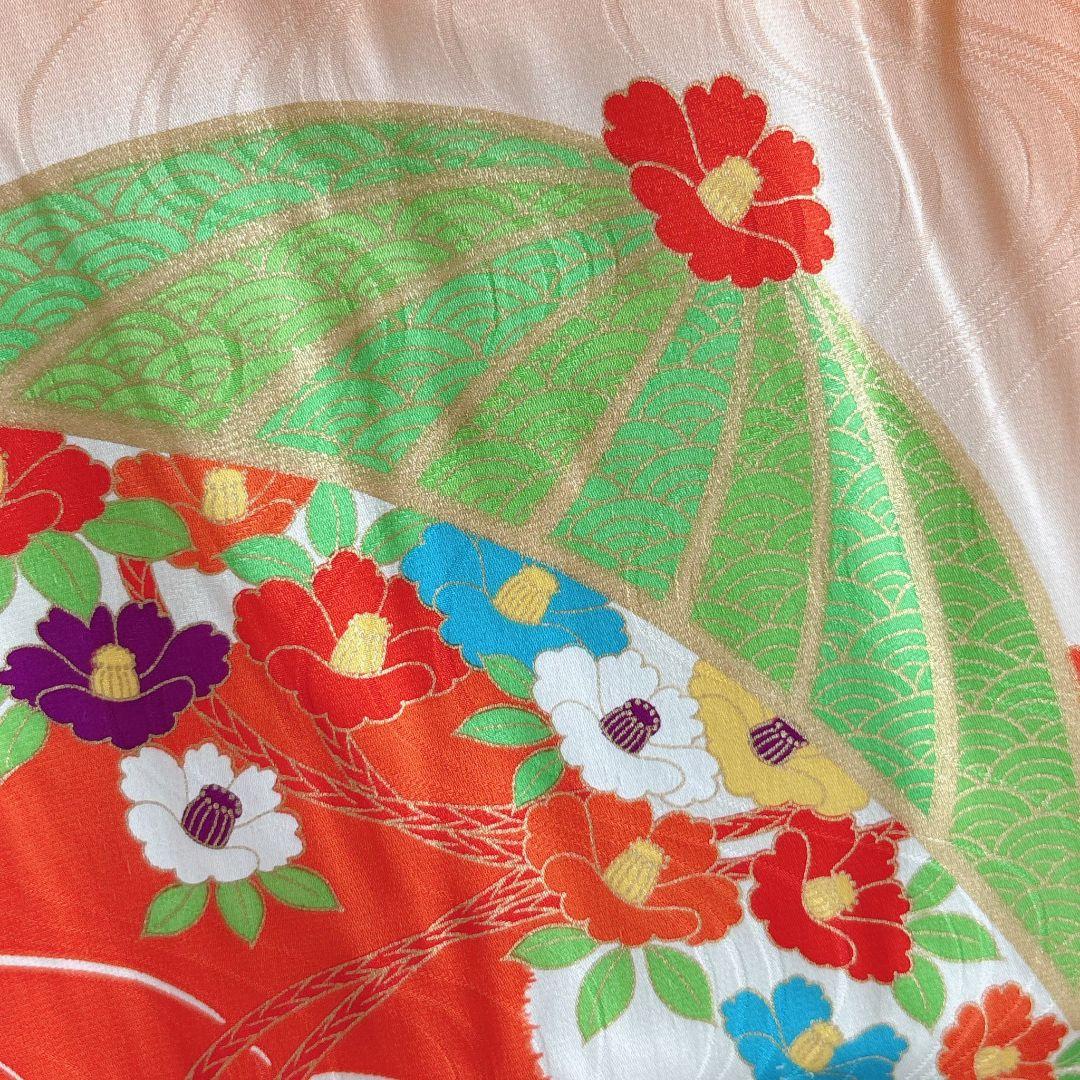 フルセット七五三７歳女の子　オレンジ地　傘椿　黒地袋帯　袖なし長襦袢7125