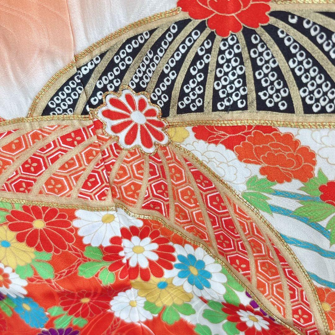 フルセット七五三７歳女の子　オレンジ地　傘椿　黒地袋帯　袖なし長襦袢7125