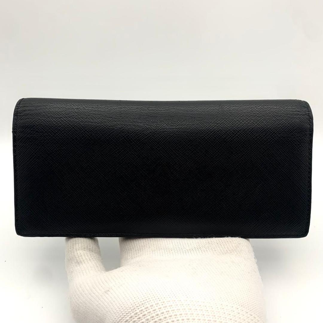 鑑定済み 美品 プラダ 二つ折り 長財布 サフィアーノ レザー 金具 ロゴ 黒
