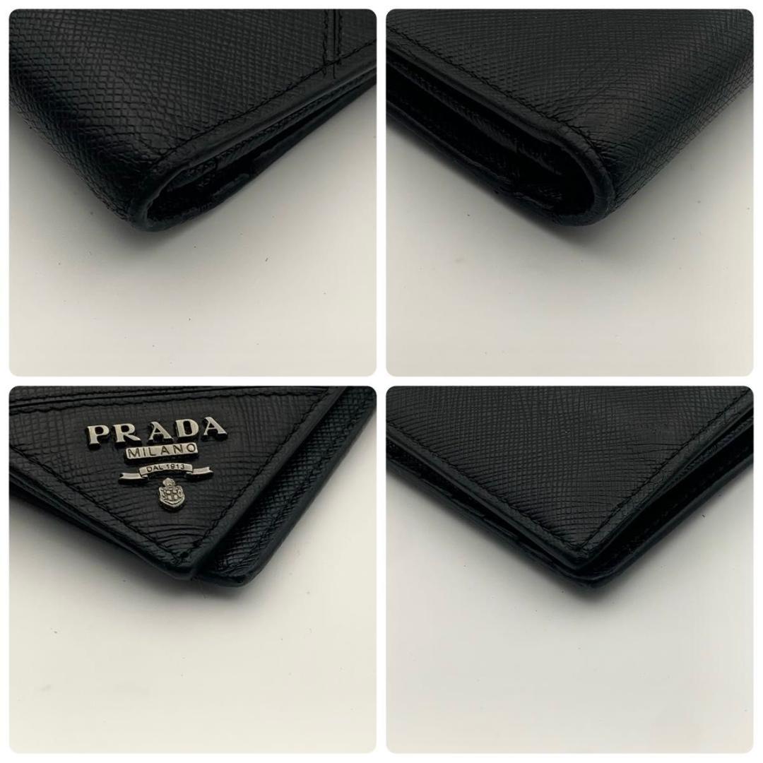 鑑定済み 美品 プラダ 二つ折り 長財布 サフィアーノ レザー 金具 ロゴ 黒
