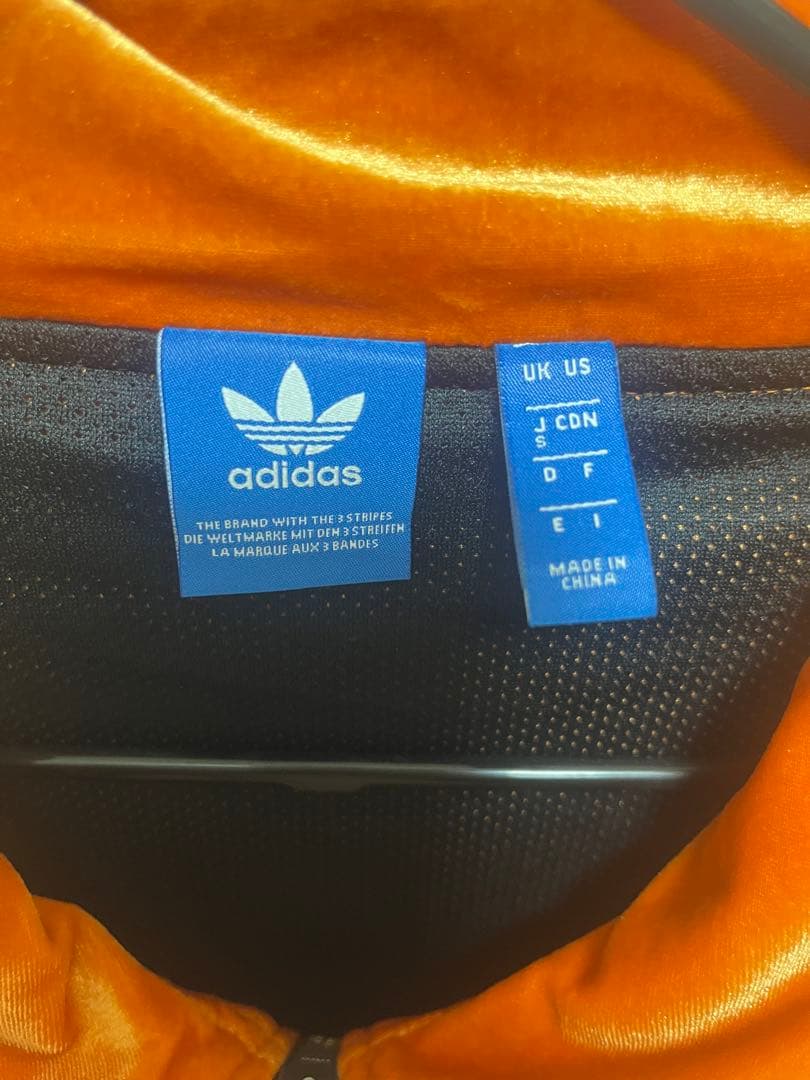 adidas ベロア ジャージ オレンジ トラックジャケット オレンジ