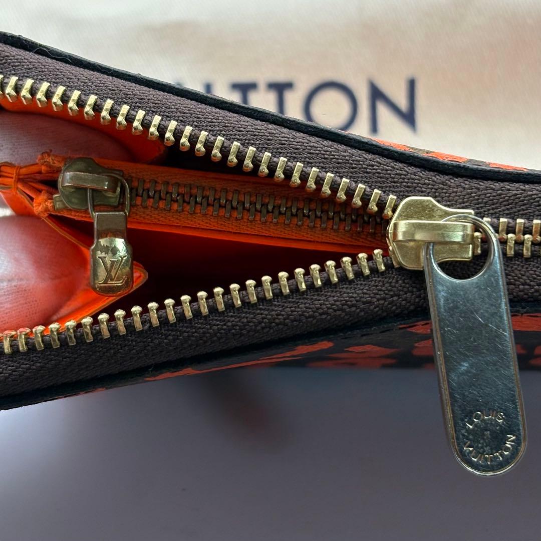 ルイヴィトンモノグラム　グラフィティオランジュ　ジッピーウォレット　M93711