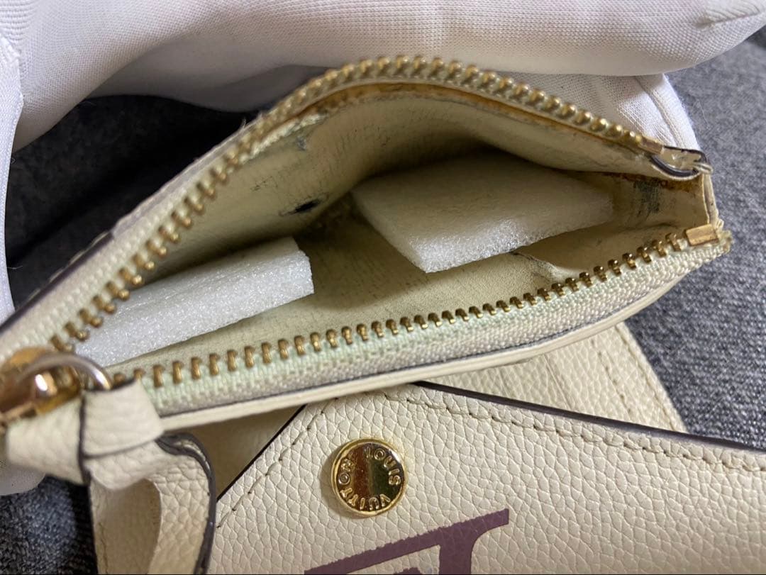 M*u様 LOUIS VUITTON 三つ折り財布