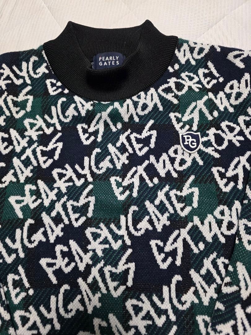 お値下げしました!新品同様PEARLY GATES 落書きシリーズセーター５