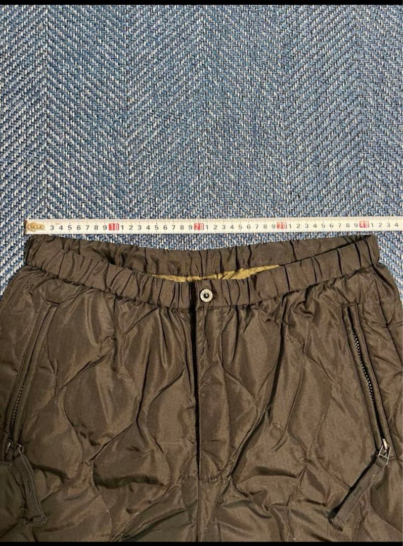 クマミ 限定価格タイオン　ダウンジップスリット