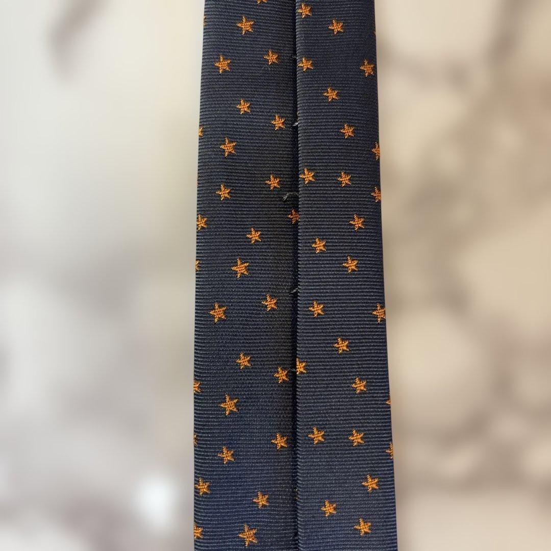【極美品✨】HERMES ネクタイ　ネイビー　紺　オレンジ　スター　星　刺繍