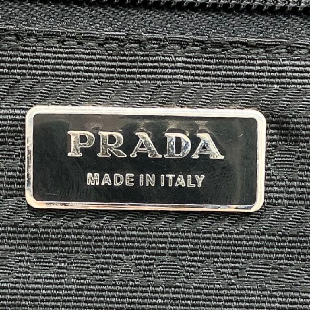 【PRADA】キャリーケース　スーツケース　三角ロゴプレート　ナイロン　黒色