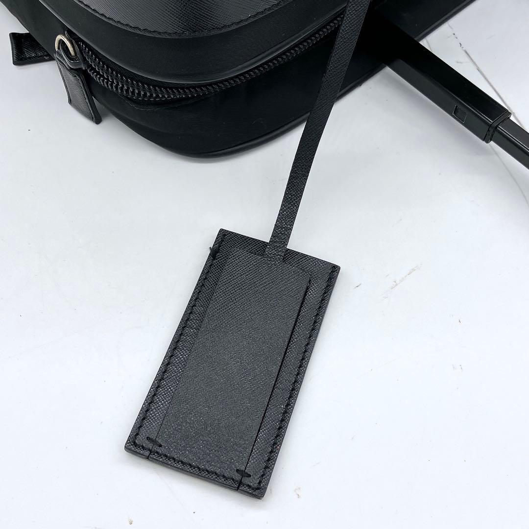 【PRADA】キャリーケース　スーツケース　三角ロゴプレート　ナイロン　黒色