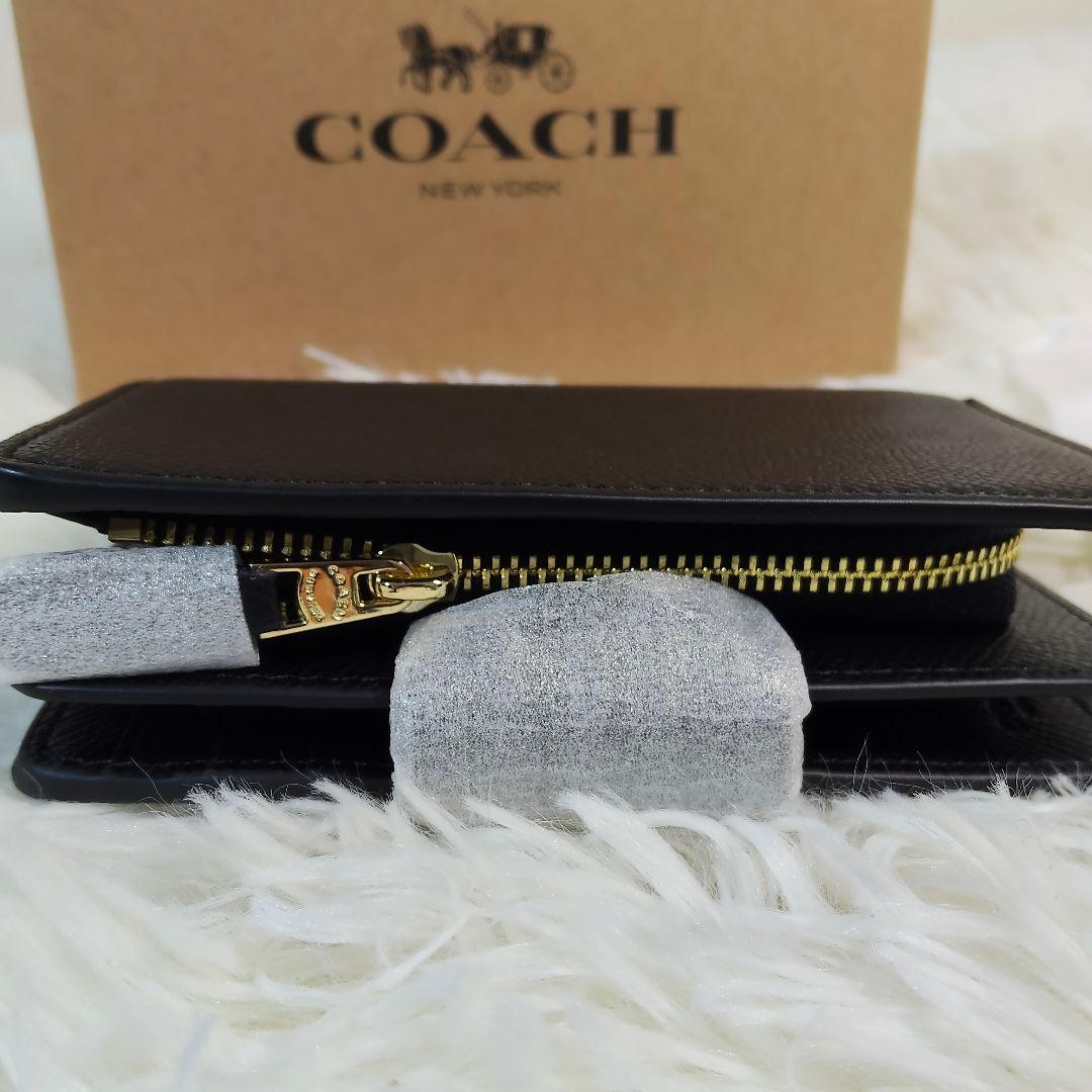 新品✨COACH ブラック レザー 二つ折り 財布 シンプル