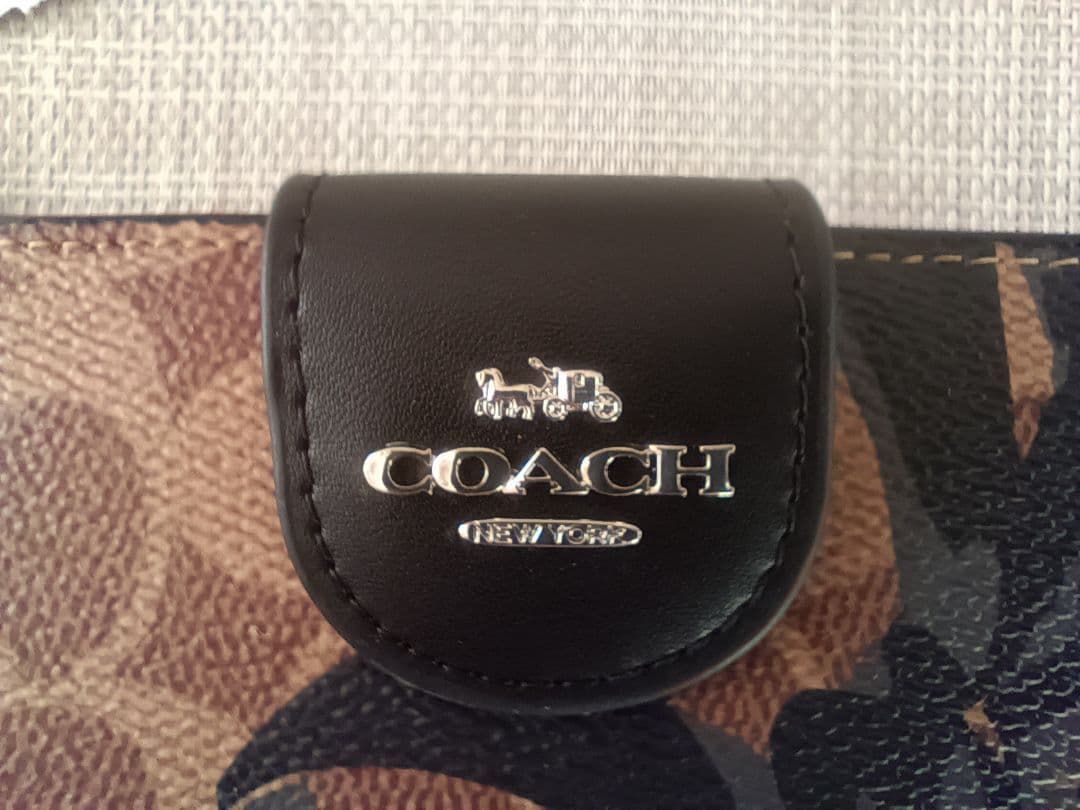 ＣOACH 二つ折り財布 フラワーパターン