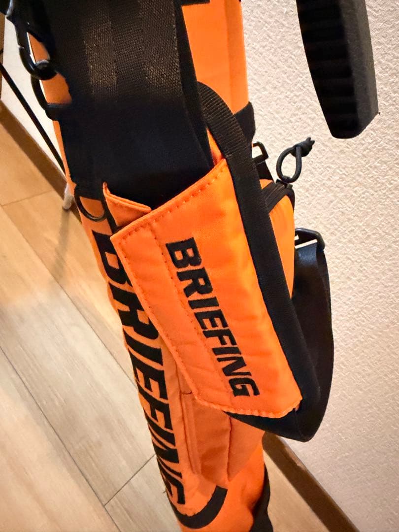 【レア】【新品未使用】ブリーフィング　セルフスタンド　キャディバッグ　オレンジ
