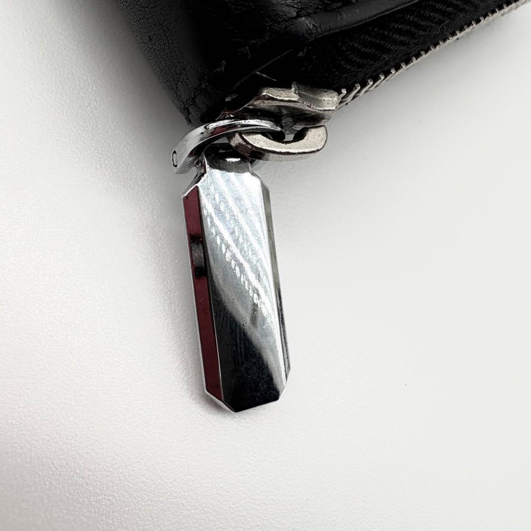 GUCCI　長財布　シマ　レザー　黒　ラウンドファスナー　GG柄　エンボス