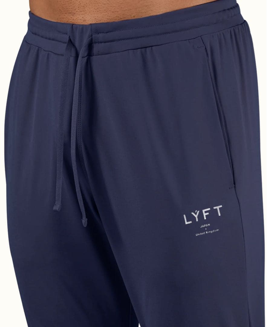 ウォーキング・ランニングウェア LYFT 2WAY STRETCH TAPERED PANTS V.2 NAVY
