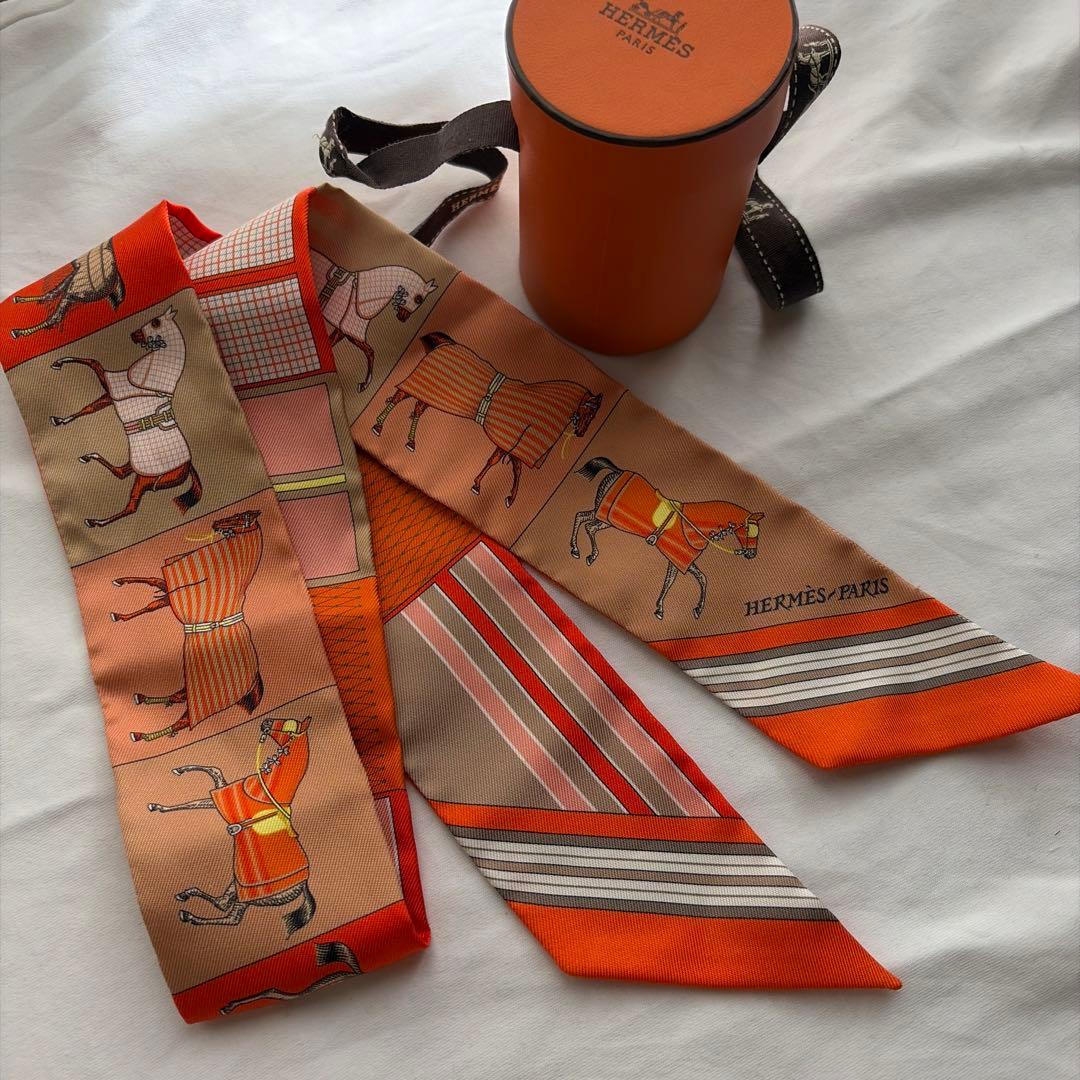 HERMES ツイリー　オレンジ系　馬柄